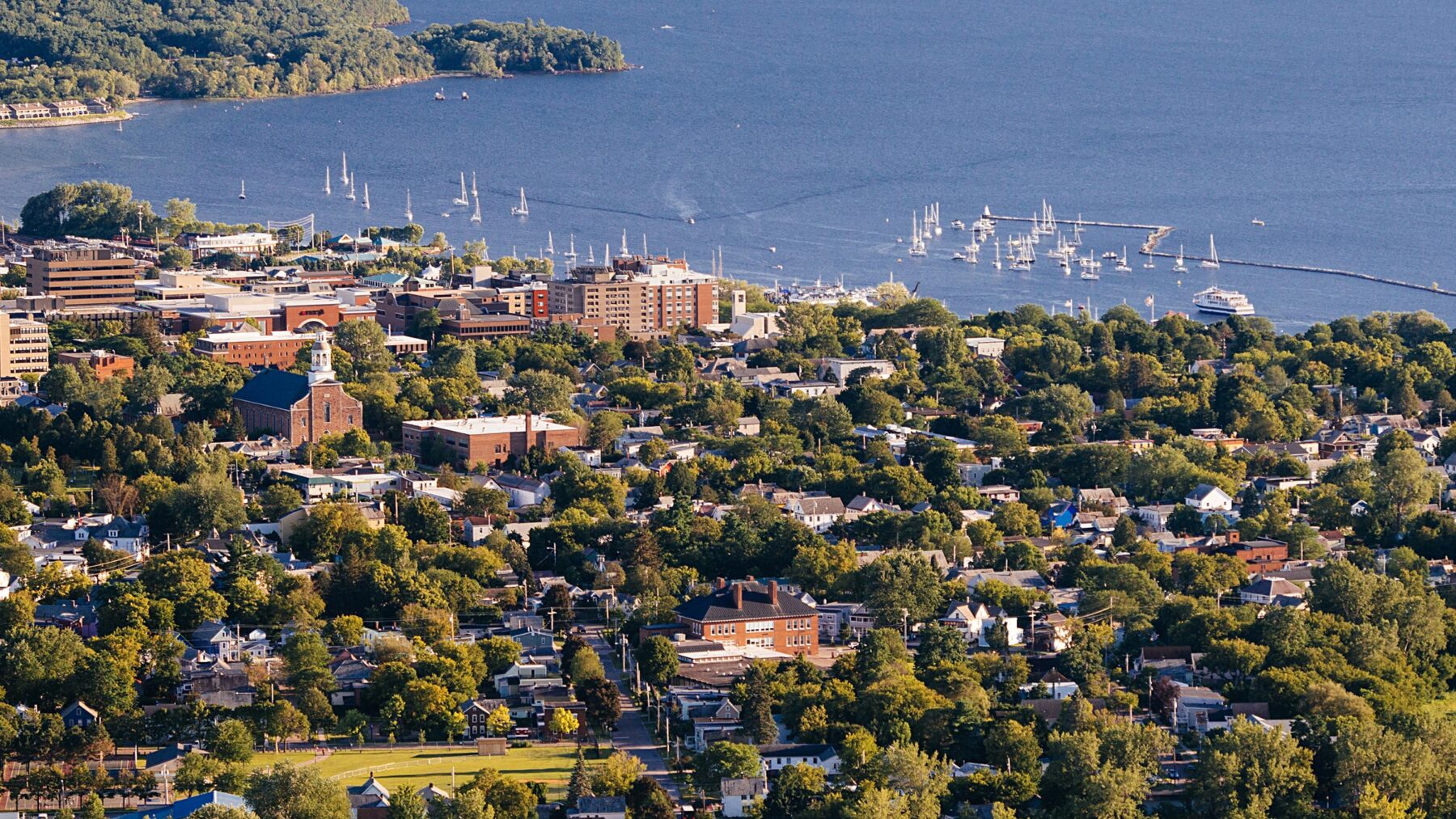 bird's eye overview of Burlington, VT, buildings, trees, Lake Champlain